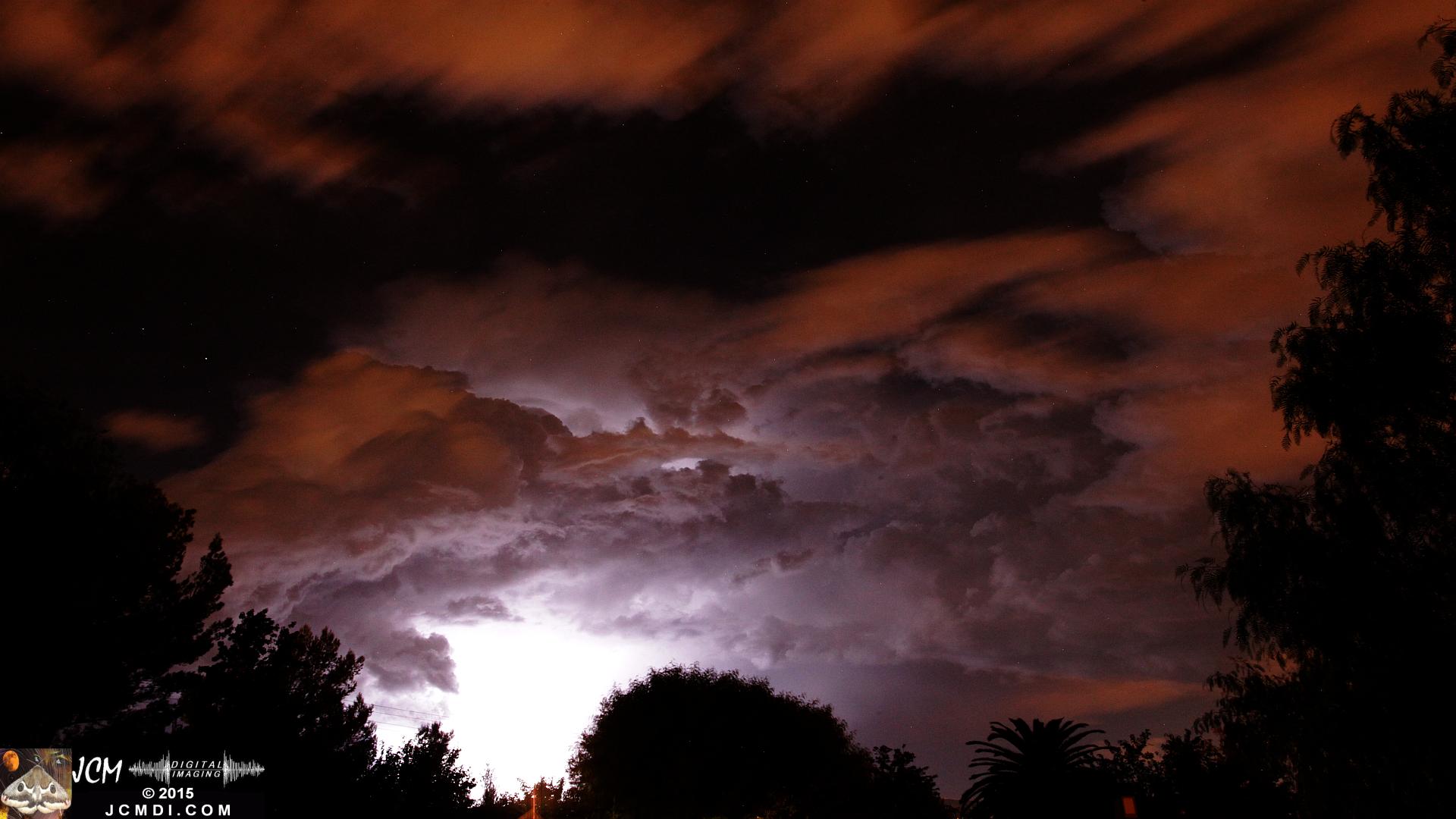 A lightning flash illuminates the night sky over Santa Clarita, Oct. 14, 2015 JCMDI.COM